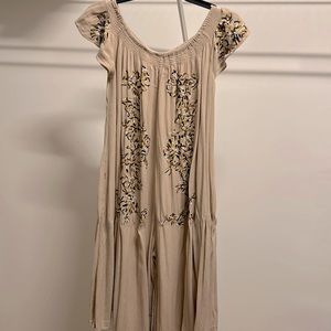 Free People romper. Embroidered detail. XS